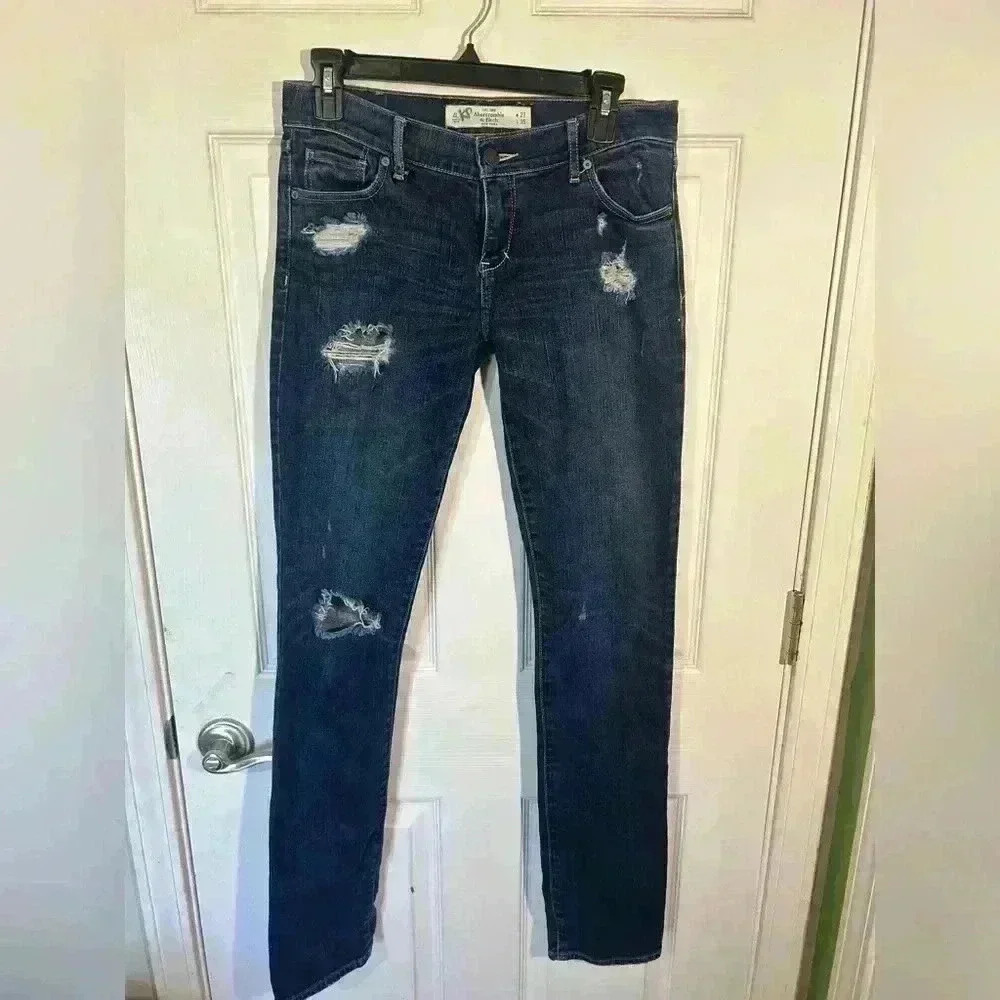 Abercrombie & Fitch Medium/Dark wash Distressed size 27/4L Perfect Stretch. Erin